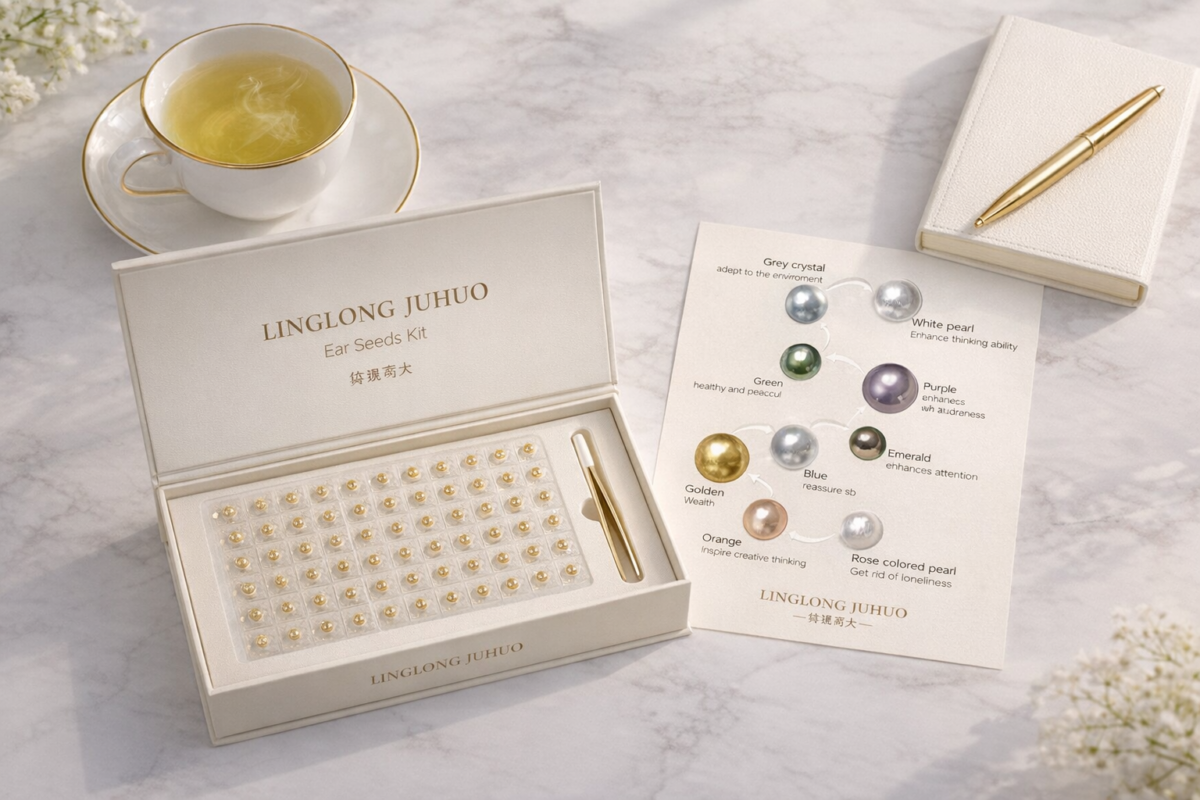 A person beginning their morning self-care ritual with a cup of tea and a LINGLONG JUHUO ear seed kit.